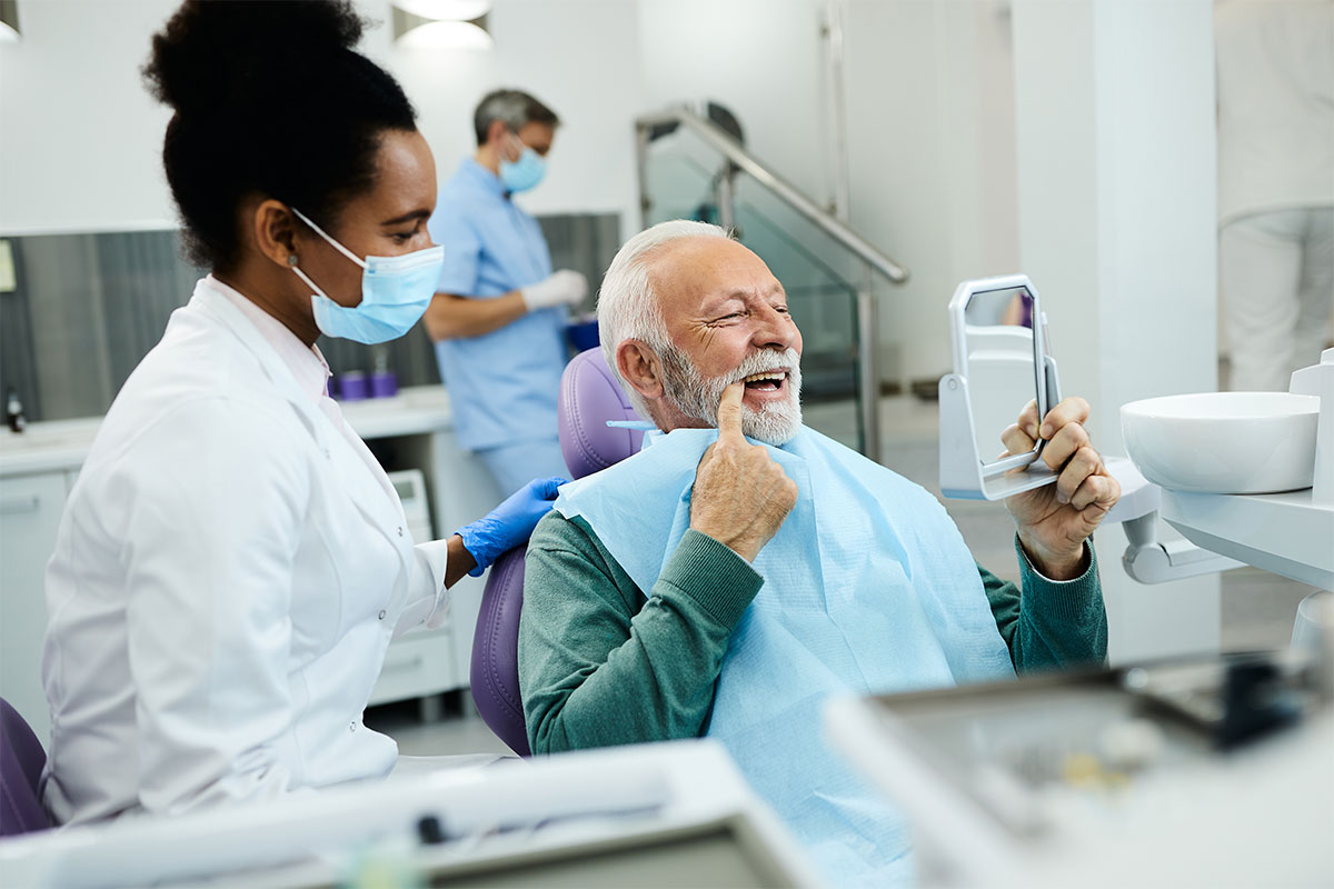patient durin exam for All-On-Four in Austin